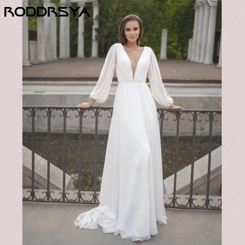 RODDRSYA Beach Backless Wedding Dresses Chiffon Puff Long Sleeves Robe De Soirée Sweep Train Plus Size Bridal Party Custom Made
RODDRSYA Beach Backless Wedding Dresses Chiffon Puff Long Sleeves Robe De Soirée Sweep Train Plus Size Bridal Party Custom Made