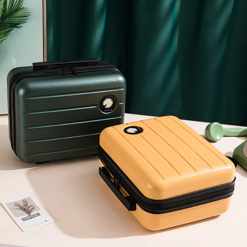 New Korean version of the 14-inch cosmetic case portable mini suitcase printed luggage small suitcase portable and light.
New Korean version of the 14-inch cosmetic case portable mini suitcase printed luggage small suitcase portable and light.