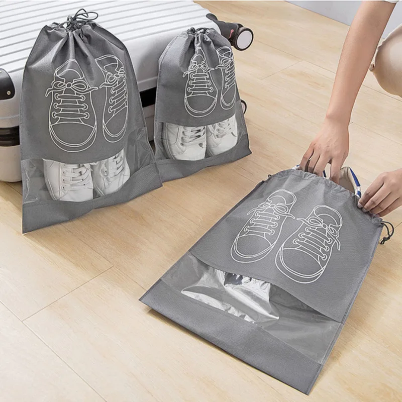 Nonwoven Shoe Storage Bag, Drawstring Design, Environmentally Friendly Material, Dustproof, Transparent Travel Shoe Cover
Nonwoven Shoe Storage Bag, Drawstring Design, Environmentally Friendly Material, Dustproof, Transparent Travel Shoe Cover