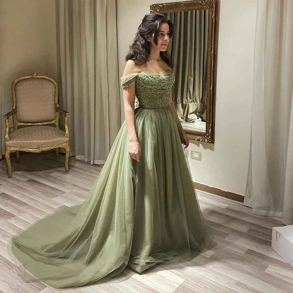 Elegant Tulle Prom Dresses Off the Shoulder Crystal Beading Sequined Saudi Arabic A-Line Evening Gown Formal Party Dress 2023
Elegant Tulle Prom Dresses Off the Shoulder Crystal Beading Sequined Saudi Arabic A-Line Evening Gown Formal Party Dress 2023