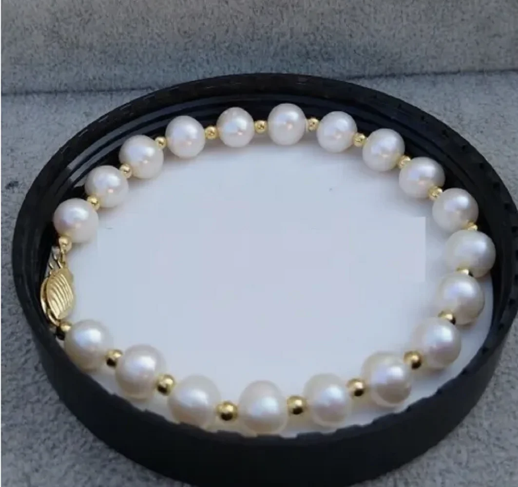 

Brand new natural AAA++South Sea white pearl bracelet with 7.5 inch 14k gold buckle