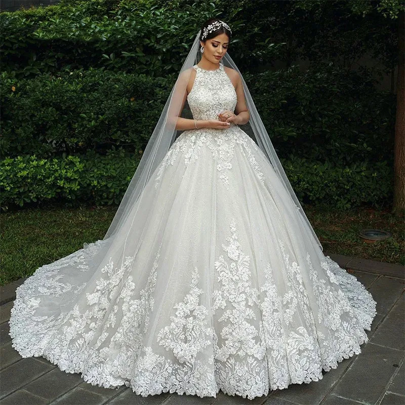 Sexy Halter Wedding Dresses Elegant Sleeveless Lace Appliques Backless Ball Gown Tulle Bridal Gown Count Train Vestidos Novias
Sexy Halter Wedding Dresses Elegant Sleeveless Lace Appliques Backless Ball Gown Tulle Bridal Gown Count Train Vestidos Novias