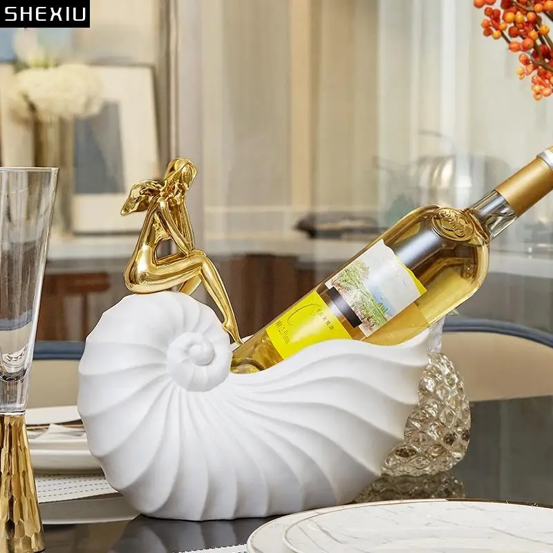 White Conch Beauty Wine Rack Ornaments Abstract Characters Candy Small Objects Storage Box Wine Cabinet Living Room Decoration
White Conch Beauty Wine Rack Ornaments Abstract Characters Candy Small Objects Storage Box Wine Cabinet Living Room Decoration