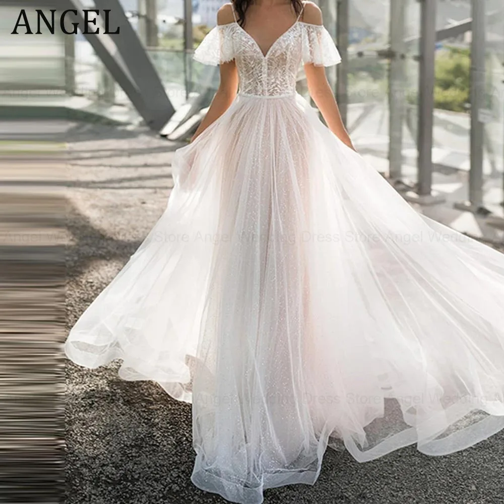 ANGEL Elegant Spaghetti Strap Off Shoulder V-Neck A-Line Wedding Dress For Bride Button Decoration Tulle Illusion Bridal Gown
ANGEL Elegant Spaghetti Strap Off Shoulder V-Neck A-Line Wedding Dress For Bride Button Decoration Tulle Illusion Bridal Gown