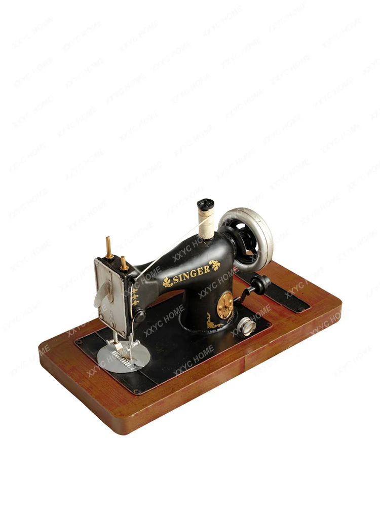 Antique Sewing Machine Iron Sheet Model Clothing Store Window Nostalgic Antique Decorative Ornaments
Antique Sewing Machine Iron Sheet Model Clothing Store Window Nostalgic Antique Decorative Ornaments