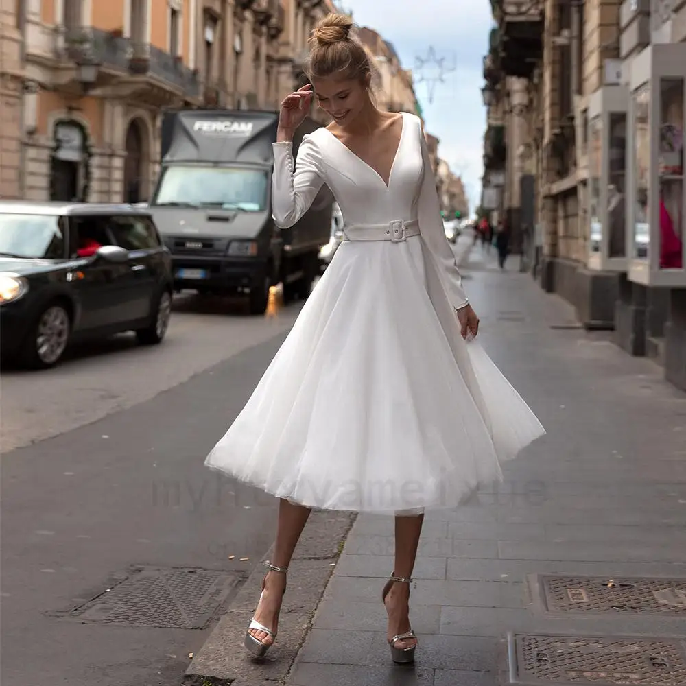 Sexy Simple Short Wedding Dresses 2023 Long Sleeve Tulle Tea-length Bridal Party Gown Belt V-neck A-line Button Back Custom Made
Sexy Simple Short Wedding Dresses 2023 Long Sleeve Tulle Tea-length Bridal Party Gown Belt V-neck A-line Button Back Custom Made