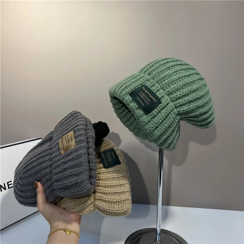 Winter thickened warm knitted hat letter patch wool beanie hat net red cold hat ear protection hat
Winter thickened warm knitted hat letter patch wool beanie hat net red cold hat ear protection hat