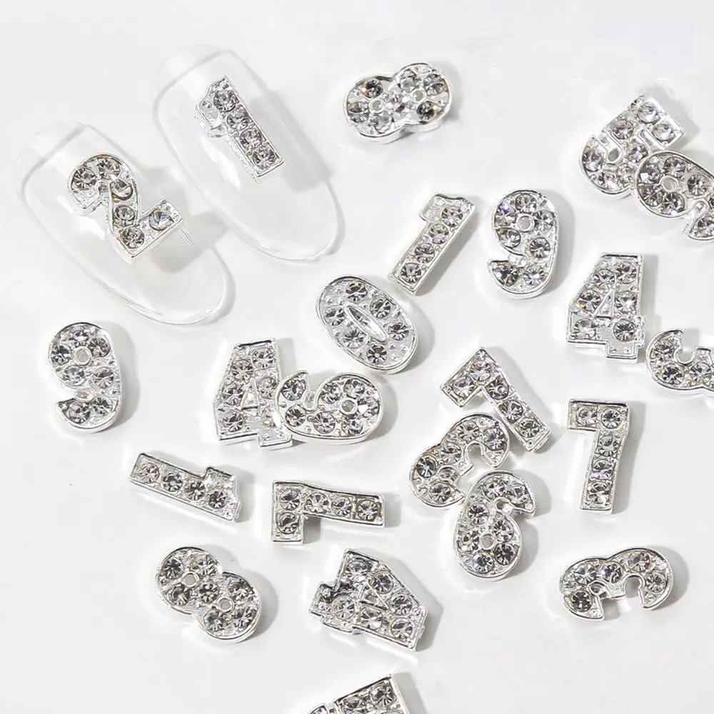Metal Silver Color Jewelry 0-9 Number Nail Charms Zircon Rhinestone Nail Tool 3D Manicure Accessories DIY Nail Art Decorations
Metal Silver Color Jewelry 0-9 Number Nail Charms Zircon Rhinestone Nail Tool 3D Manicure Accessories DIY Nail Art Decorations