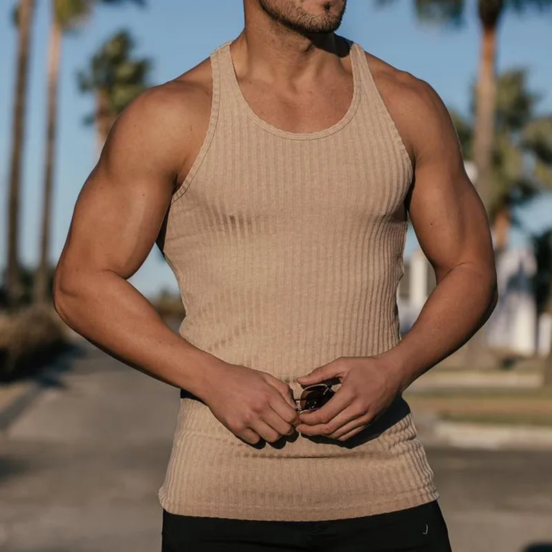 Tank Top Casual Men Bodybuilding Clothing Fitness Mens Sleeveless Gyms Vests Singlets Muscle Tops Tight bodybuilding sleeveless
Tank Top Casual Men Bodybuilding Clothing Fitness Mens Sleeveless Gyms Vests Singlets Muscle Tops Tight bodybuilding sleeveless
