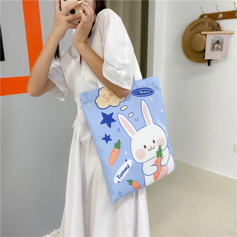 Cartoon Shoulder Bag Women Canvas Large Capacity Book Storage Bags Student Korean Fashion Original Design Shopping Bags Female
Cartoon Shoulder Bag Women Canvas Large Capacity Book Storage Bags Student Korean Fashion Original Design Shopping Bags Female
