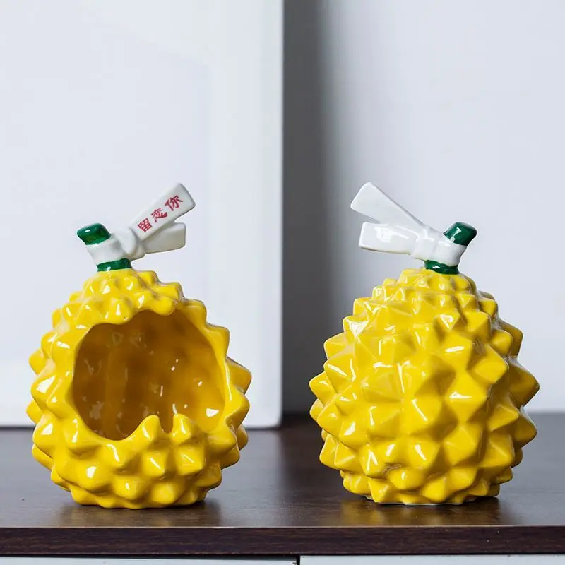 Creative Ceramic Durian Ashtray, Home Living Room, Coffee Table, Bedroom Decoration, Windproof and Fly Ash Proof
Creative Ceramic Durian Ashtray, Home Living Room, Coffee Table, Bedroom Decoration, Windproof and Fly Ash Proof