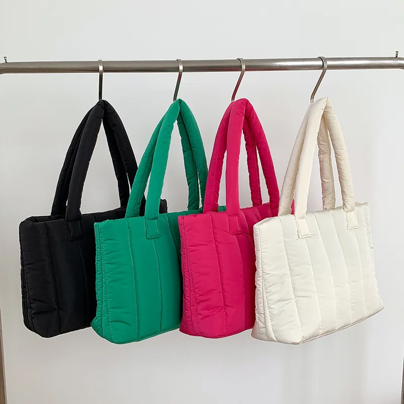 Down female 2023 autumn and winter portable cotton jacket filled cotton vertical grain single shoulder tote bag
Down female 2023 autumn and winter portable cotton jacket filled cotton vertical grain single shoulder tote bag