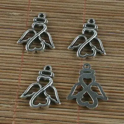 

10pcs 24mm Long x 20mm (wide),hole:1mm Tibetan silver color hollow angel style charms h0273