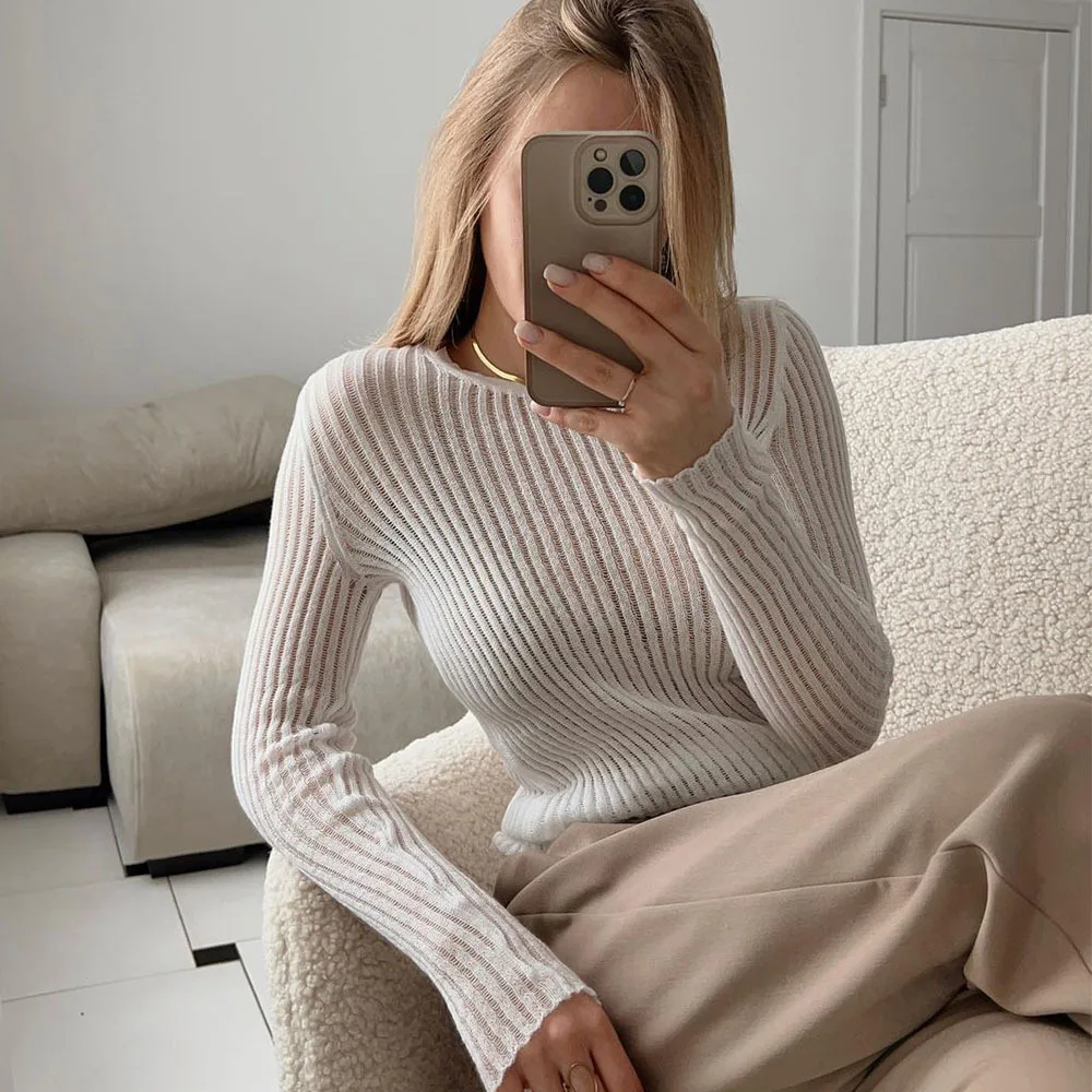 Cross border hollow out knitted sweater spring/summer sexy slim fit wool round neck long sleeved thin pit stripe knitted sweater
Cross border hollow out knitted sweater spring/summer sexy slim fit wool round neck long sleeved thin pit stripe knitted sweater
