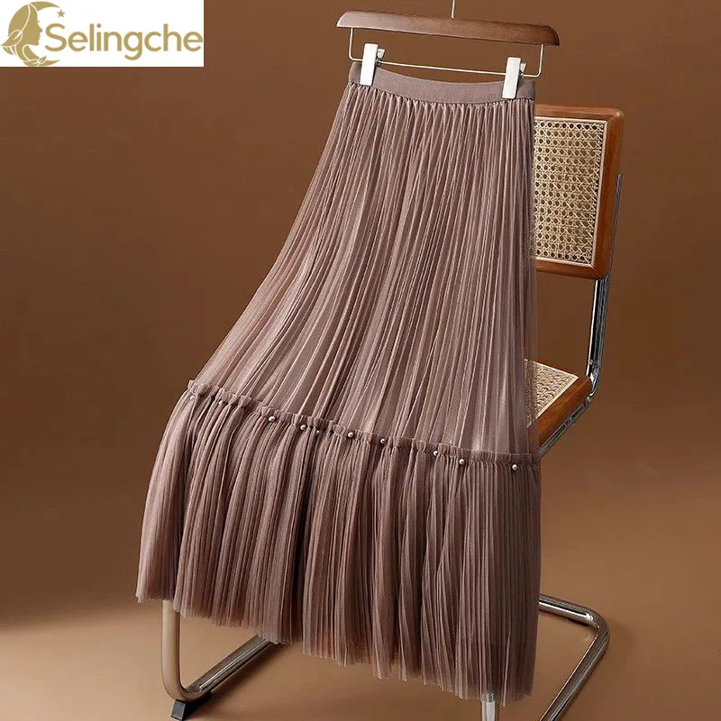 

Temperament Splicing Mesh A-line Skirt for Women in Early Spring 2024 New High Waisted Large Hem Pleated Skirt