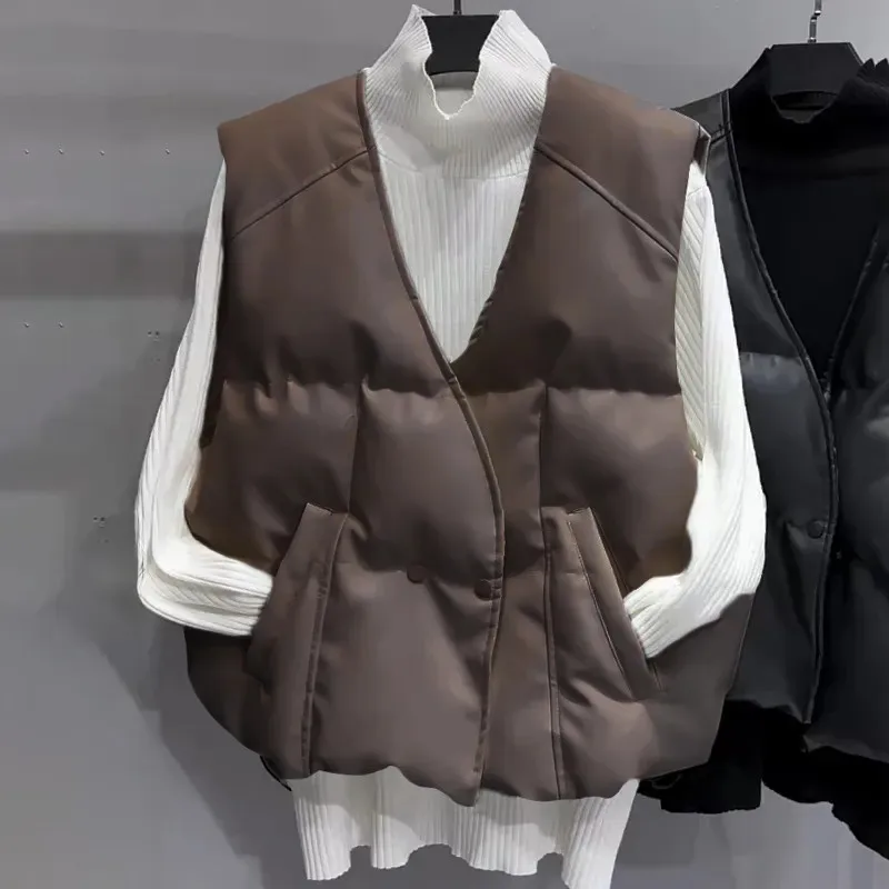 New Autumn Winter Autumn Leather Vest Women Korean Fashion Faux PU V Neck Sleeveless Jacket Female Down Cotton Waistcoat W094
New Autumn Winter Autumn Leather Vest Women Korean Fashion Faux PU V Neck Sleeveless Jacket Female Down Cotton Waistcoat W094