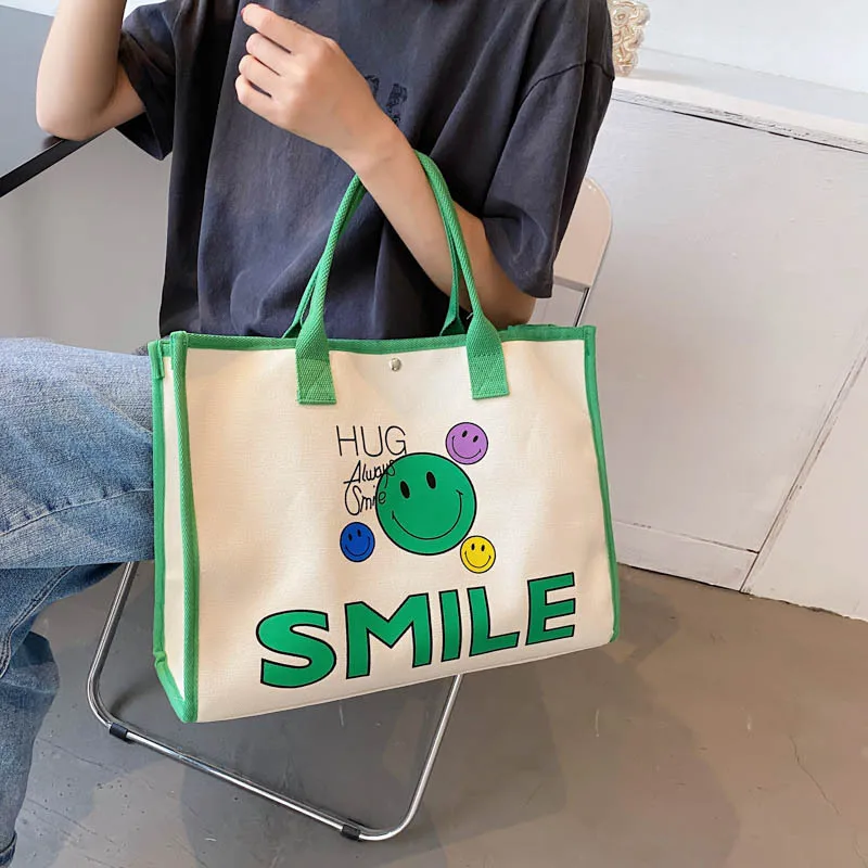 Casual Canvas Bag Cute Smile Handbag Large Capacity Handle Bag Shopping Women Tote Bag Fashion Simple Shoulder Bag Environmental
Casual Canvas Bag Cute Smile Handbag Large Capacity Handle Bag Shopping Women Tote Bag Fashion Simple Shoulder Bag Environmental