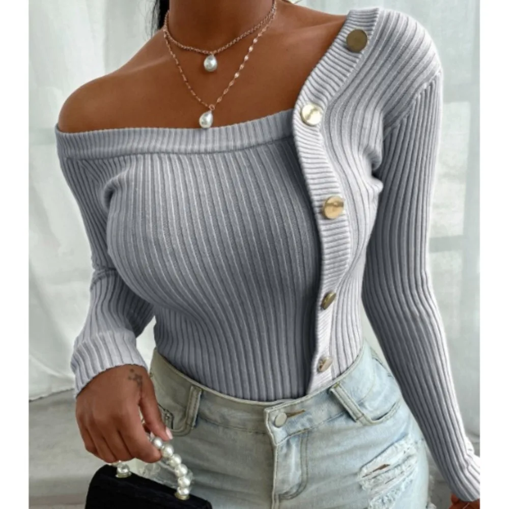 2023 autumn and winter casual button off-the-shoulder knitted pullover solid color sweater long-sleeved knitted stitching
2023 autumn and winter casual button off-the-shoulder knitted pullover solid color sweater long-sleeved knitted stitching