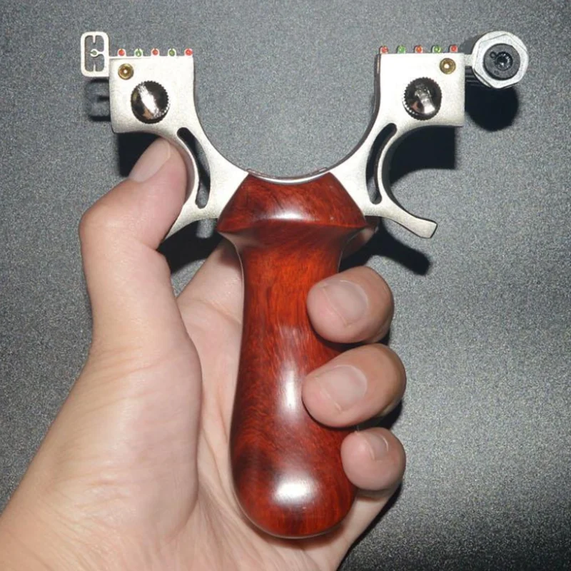 New Catapult Outdoor Hunting Power Catapult with Laser Rubber Belt Catapult with Wood Handle Alloy Catapult
New Catapult Outdoor Hunting Power Catapult with Laser Rubber Belt Catapult with Wood Handle Alloy Catapult