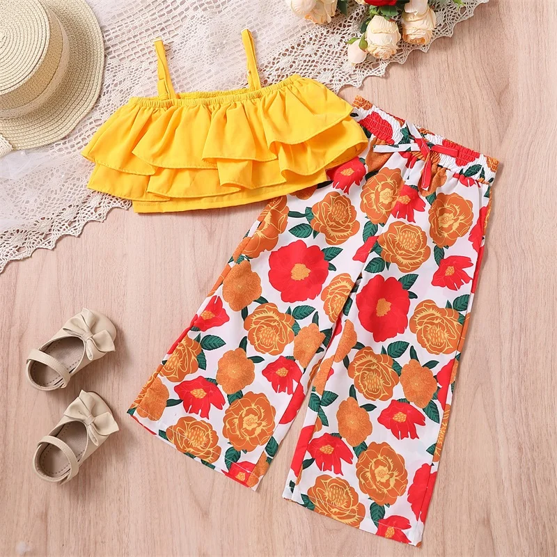 Kids Girls Clothes Suits Solid Color Ruffles Sleeveless Sling Tank Tops and Elastic Waist Flower Print Wide-Leg Pants 2Pcs Suit
Kids Girls Clothes Suits Solid Color Ruffles Sleeveless Sling Tank Tops and Elastic Waist Flower Print Wide-Leg Pants 2Pcs Suit