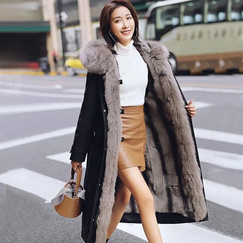 Faux Fur Coat Women 2022 Winter New Detachable Fur Collar Thick Long Imitation Fur Jacket Female Large Sized Hooded Long Parkas
Faux Fur Coat Women 2022 Winter New Detachable Fur Collar Thick Long Imitation Fur Jacket Female Large Sized Hooded Long Parkas
