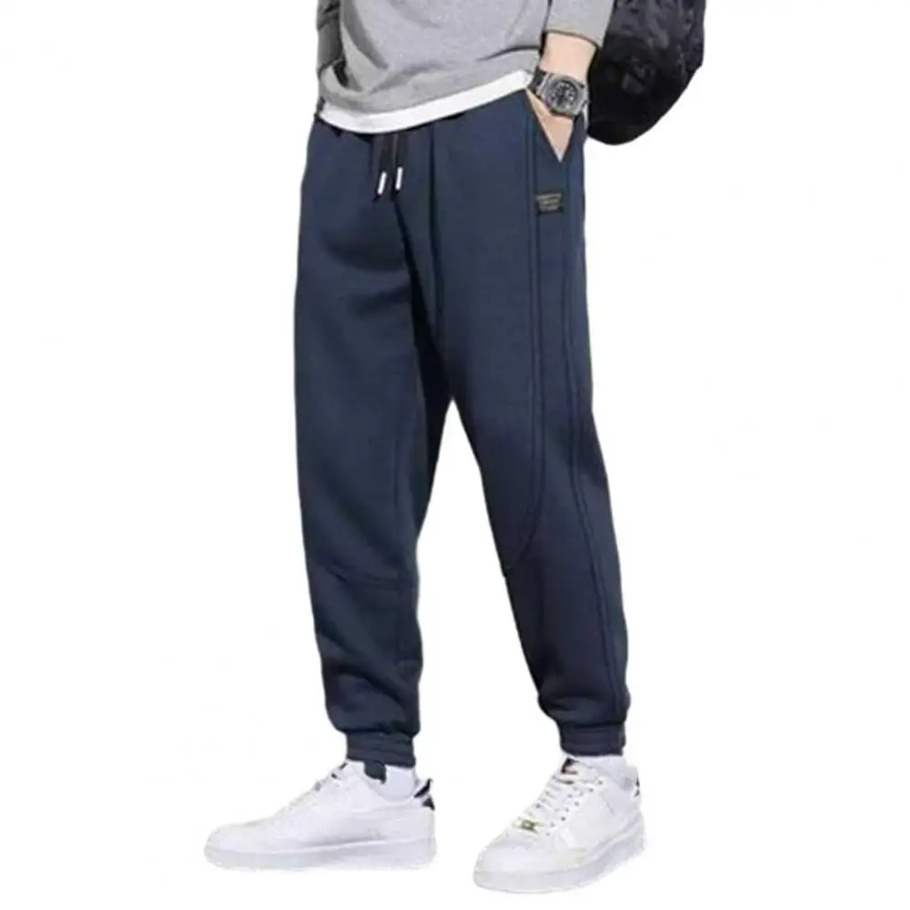 Men Pants Solid Color Drawstring Elastic Waist Solid Color Soft Warm Ankle-banded Pockets Loose Spring Fall Sports Sweatpants
Men Pants Solid Color Drawstring Elastic Waist Solid Color Soft Warm Ankle-banded Pockets Loose Spring Fall Sports Sweatpants
