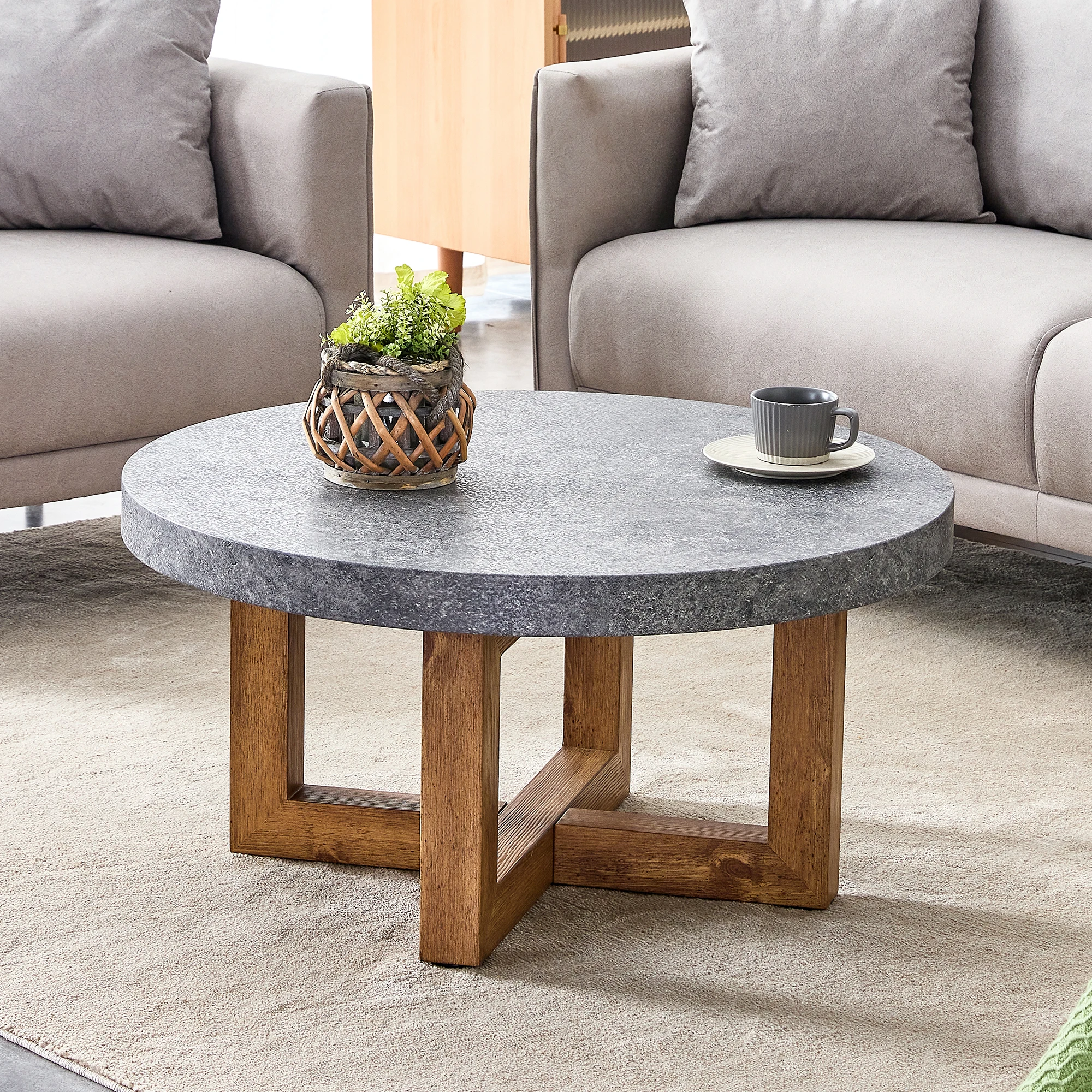 A modern retro circular coffee table with a diameter of 31.4 inches, made of MDF material, suitable for living rooms
A modern retro circular coffee table with a diameter of 31.4 inches, made of MDF material, suitable for living rooms