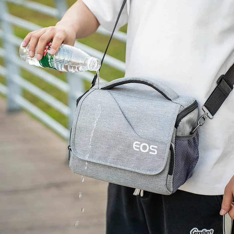 Многофункциональная водонепроницаемая сумка через плечо для камеры EOS для Canon EOS R100 R50 R10 R8 R7 R6 RP 250D 200D M200 M50
Многофункциональная водонепроницаемая сумка через плечо для камеры EOS для Canon EOS R100 R50 R10 R8 R7 R6 RP 250D 200D M200 M50