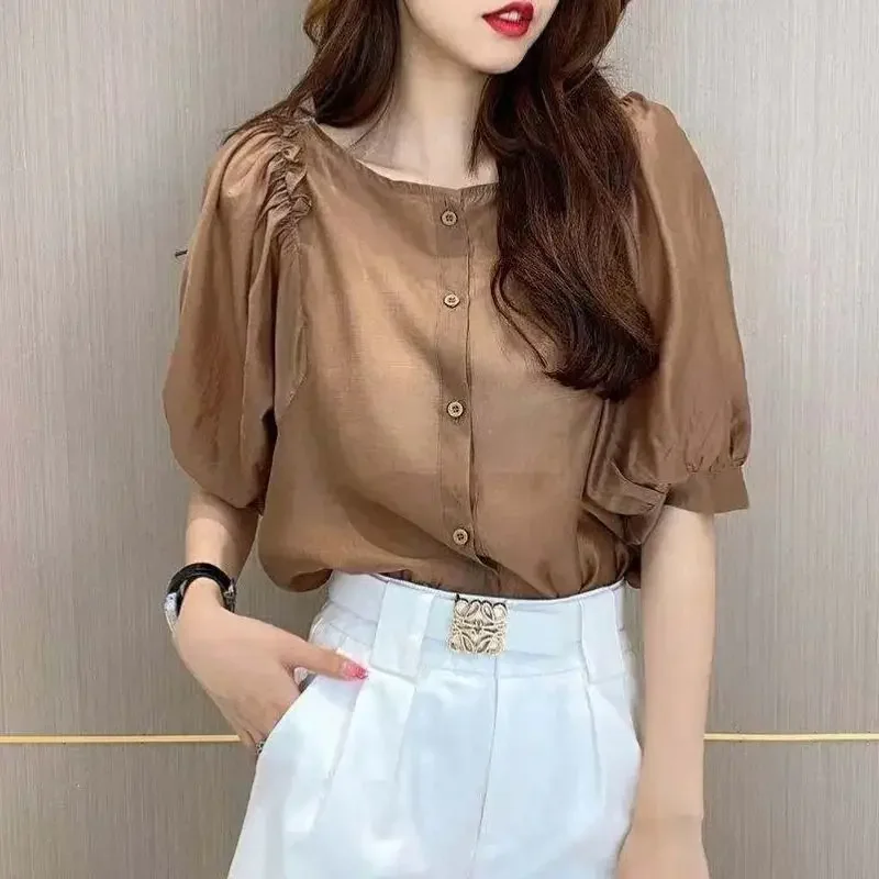 

Stylish O-Neck Button Spliced Loose Fold Puff Sleeve Shirt Female Clothing Spring New Casual Tops Solid Color Korean Blouse X690