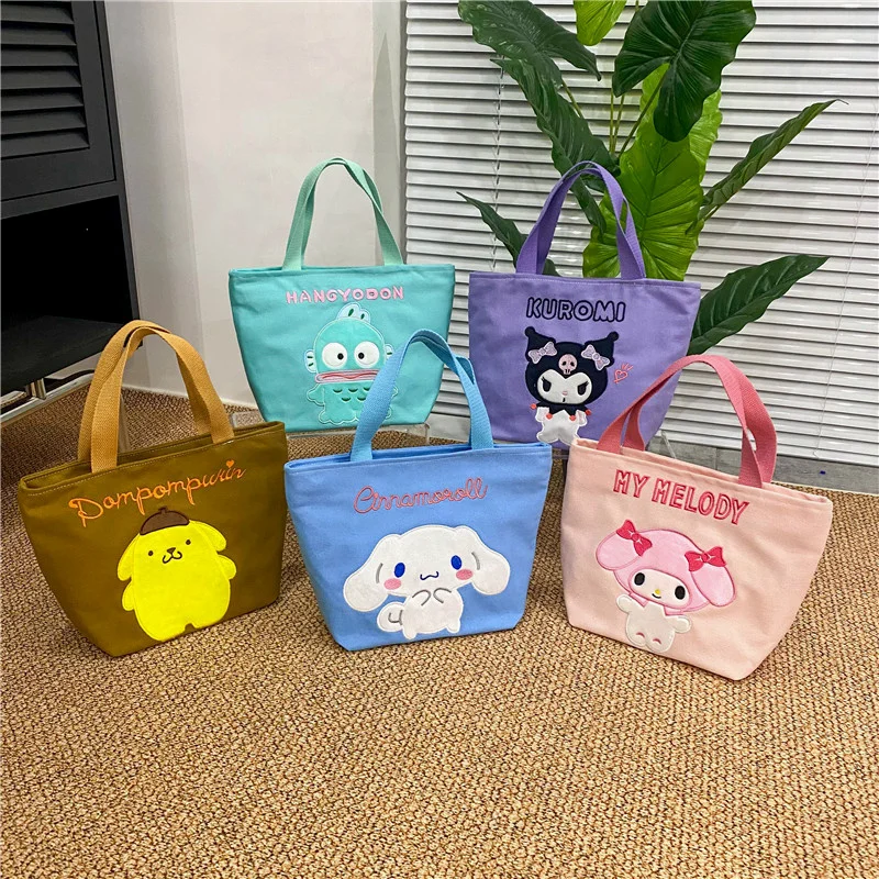 Новая сумка Sanrio Melody Kuromi, сумка на плечо, Холщовая Сумка для ланча Kawaii Cinnamoroll, вместительная сумка для хранения, подарок
Новая сумка Sanrio Melody Kuromi, сумка на плечо, Холщовая Сумка для ланча Kawaii Cinnamoroll, вместительная сумка для хранения, подарок