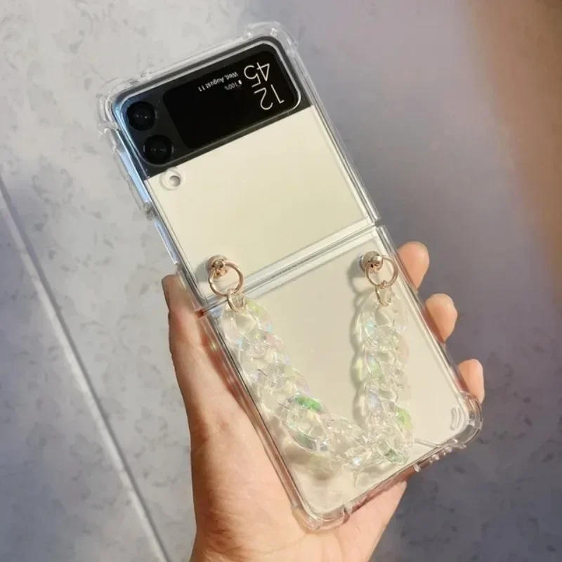 Luxury Bling Crystal Pearl Butterfly Heart Star Bracelet Chain Case Capa For Samsung GalaxyZ Flip1 2 Z Flip5 4 3 5G Phone Cover
Luxury Bling Crystal Pearl Butterfly Heart Star Bracelet Chain Case Capa For Samsung GalaxyZ Flip1 2 Z Flip5 4 3 5G Phone Cover