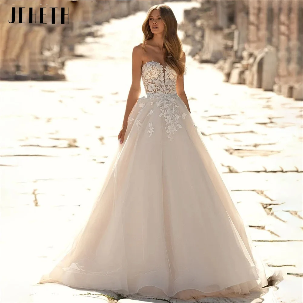 JEHETH 2023 Boho Beach Strapless A Line Wedding Dresses for Women Sleeveless Bridal Lace Appliques Bride Gowns Backless Vestidos
JEHETH 2023 Boho Beach Strapless A Line Wedding Dresses for Women Sleeveless Bridal Lace Appliques Bride Gowns Backless Vestidos
