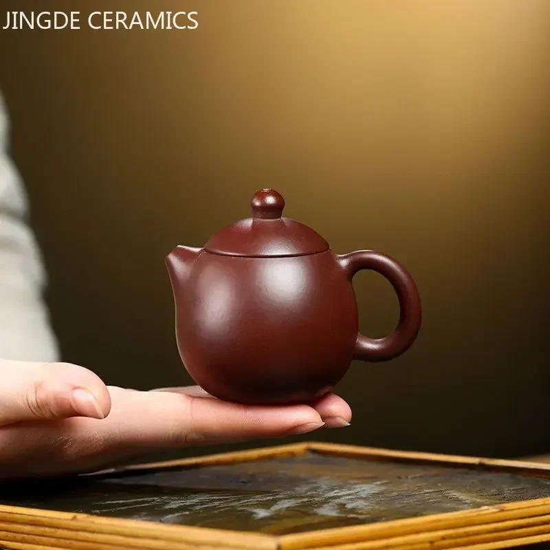 

90ml Yixing Purple Clay Teapot Handmade Raw Ore Zhu Mud Dragon Egg Kettle Home Filter Tea Infuser Small Capacity Zisha Tea Set