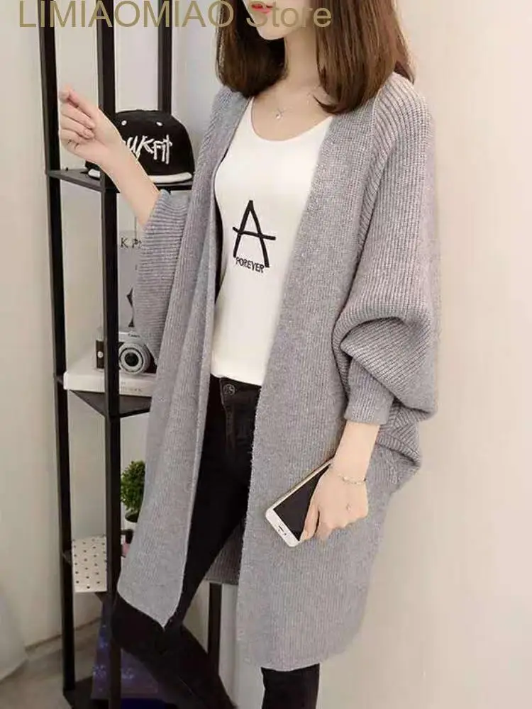 New Fashion Autumn Winter Medium Length Sweater Coat Women Knitted Cardigan Bat Sleeve Solid Color Coat Oversized Cardigan
New Fashion Autumn Winter Medium Length Sweater Coat Women Knitted Cardigan Bat Sleeve Solid Color Coat Oversized Cardigan