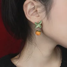 1 pair of cute persimmon earrings retro style glass leaf fruit persimmon earrings orange girl earrings jewelry accessories 
1 pair of cute persimmon earrings retro style glass leaf fruit persimmon earrings orange girl earrings jewelry accessories