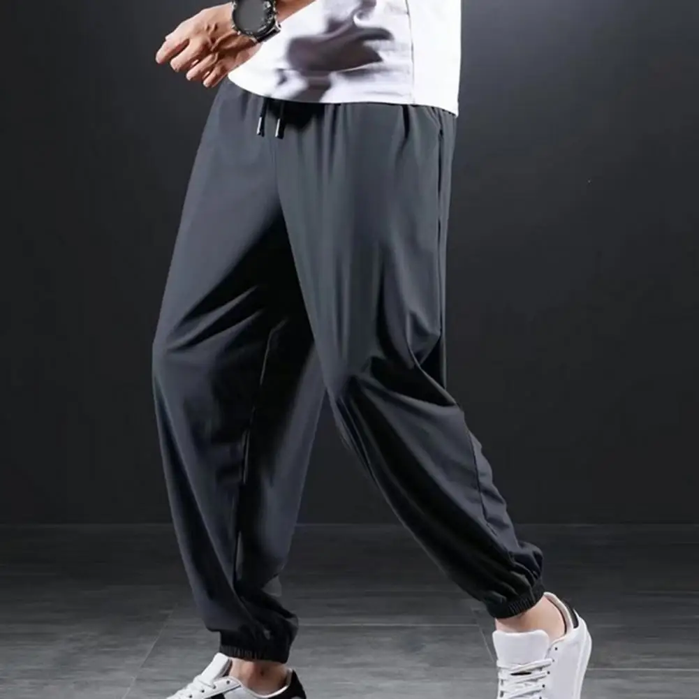 

Men Loose-fitting Pants Breathable Men's Sport Pants with Ankle-banded Pockets Drawstring Waist for Gym Training Jogging Soft