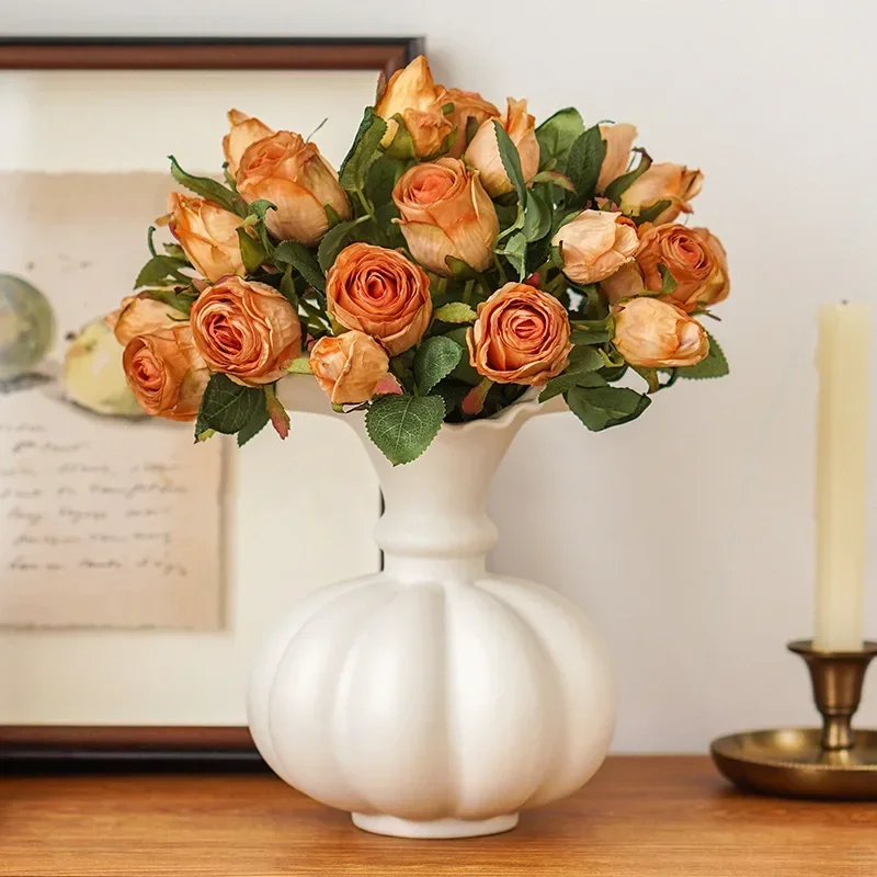 White Retro Ceramic Pumpkin Vase Abstract Art Home Soft Decoration Art Ornaments Living Room and Office Decoration 
White Retro Ceramic Pumpkin Vase Abstract Art Home Soft Decoration Art Ornaments Living Room and Office Decoration