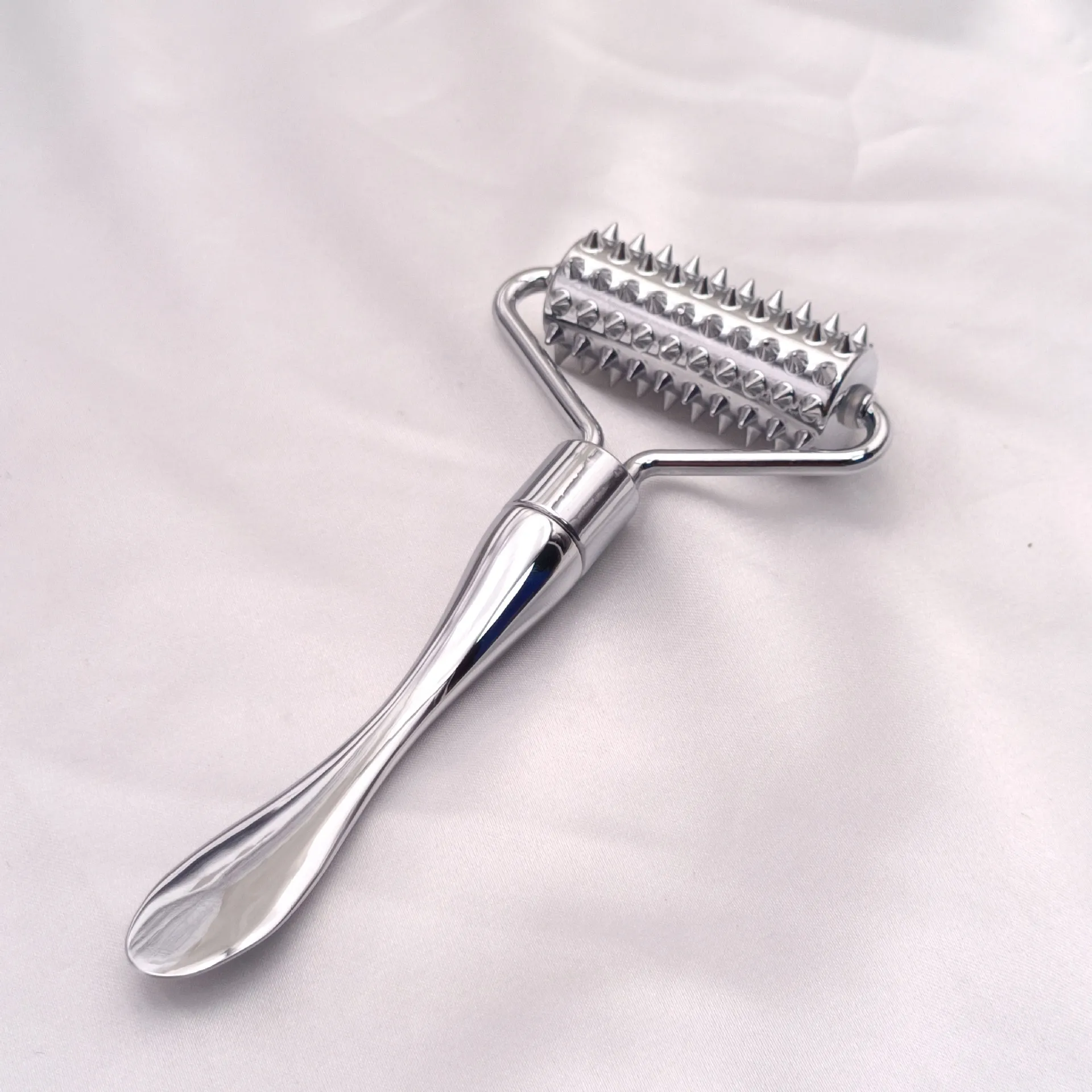 Stainless steel pointed roller spatula massage ball stone face roller massager to improve neck facial beauty skin care tool
Stainless steel pointed roller spatula massage ball stone face roller massager to improve neck facial beauty skin care tool