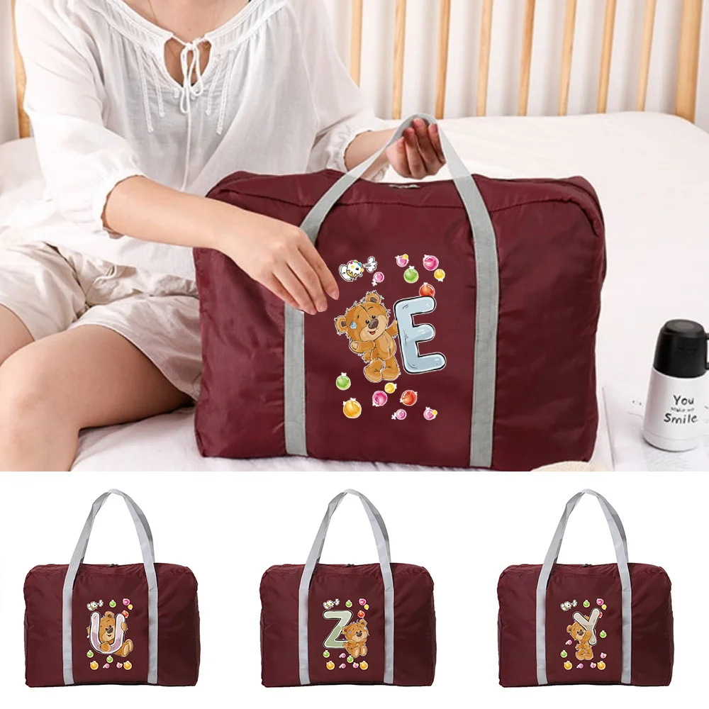 Large Capacity Storage Folding Bag Carry on Luggage Handbag Bear Letter Print Duffel Set Women Dropshipping Travel Bags Tote
Large Capacity Storage Folding Bag Carry on Luggage Handbag Bear Letter Print Duffel Set Women Dropshipping Travel Bags Tote