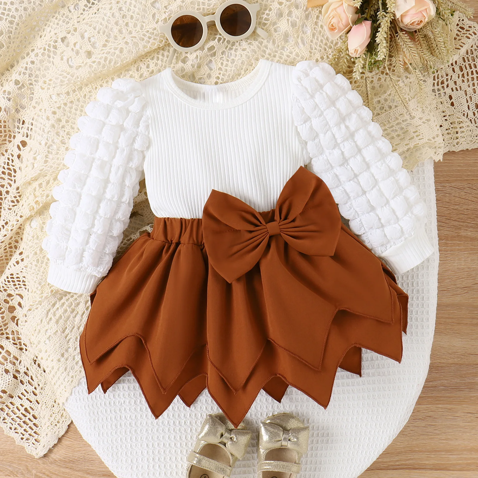 

Autumn and Winter New Female Infant and Children's Set Bubble Sleeve Pit Stripe Top Solid Color Bow Skirt Hem Fashion