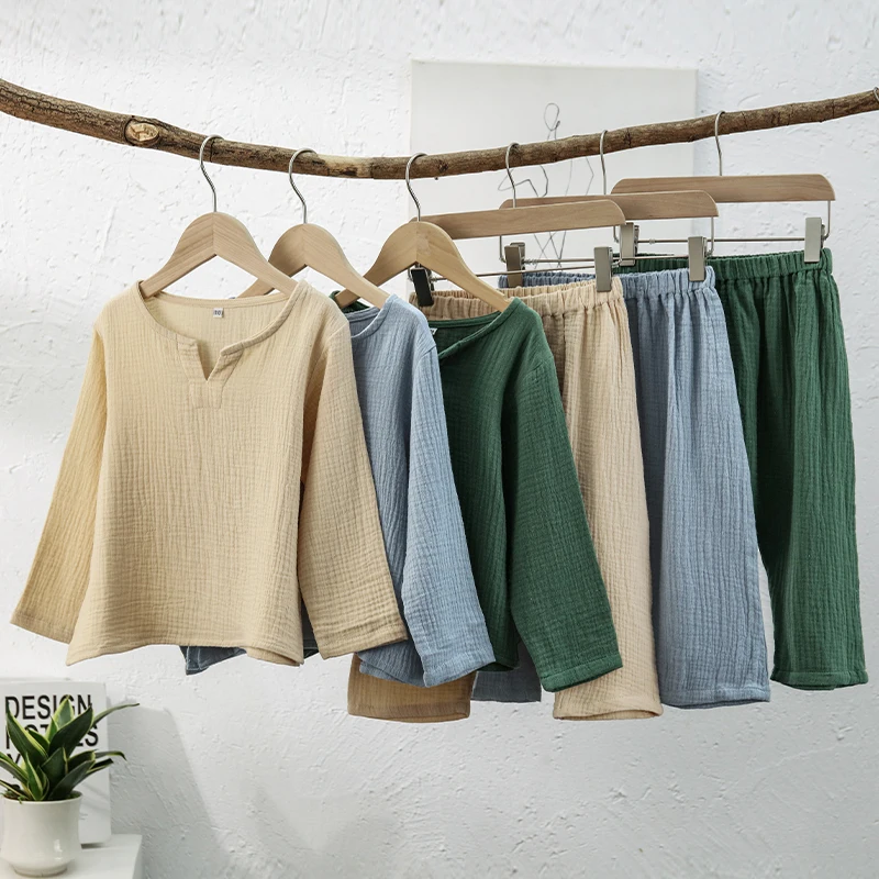Autumn New Children's Long-Sleeved Suit 100%Cotton Crepe Boys And Girls Casual V-Neck Loose Tops + Elastic Waist Pants 2pcs Sets
Autumn New Children's Long-Sleeved Suit 100%Cotton Crepe Boys And Girls Casual V-Neck Loose Tops + Elastic Waist Pants 2pcs Sets