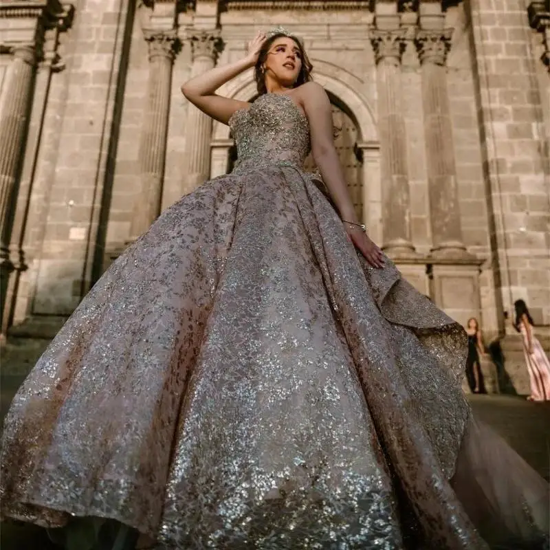 Sparkly Rose Gold Princess Quinceanera Dresses With Bow Ball Gown Glitter Appliques Crystals Beads Sweet 16 Dress Prom
Sparkly Rose Gold Princess Quinceanera Dresses With Bow Ball Gown Glitter Appliques Crystals Beads Sweet 16 Dress Prom