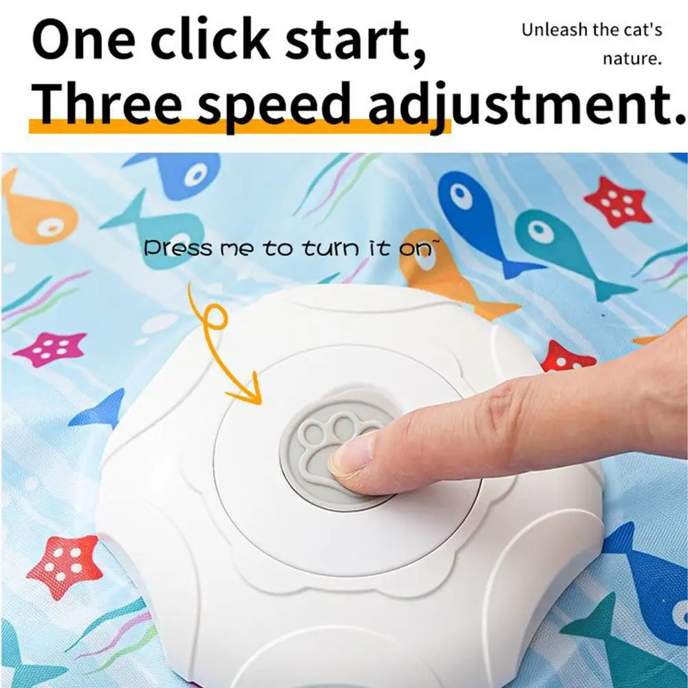 Indoor Cat Toy | Star-Shaped Automatic Cat Toys A close-up shot of a finger pressing the grey paw-print power button on the white center hub. Text highlights "One click start, Three speed adjustment."