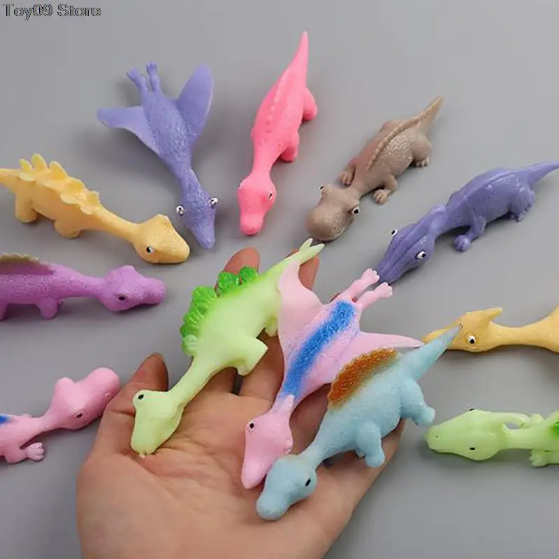 

Random 5pcs Catapult Launch Soft Glue Dinosaur Fun Tricky Slingshot Practice Elastic Flying Finger Sticky Decompression Toy