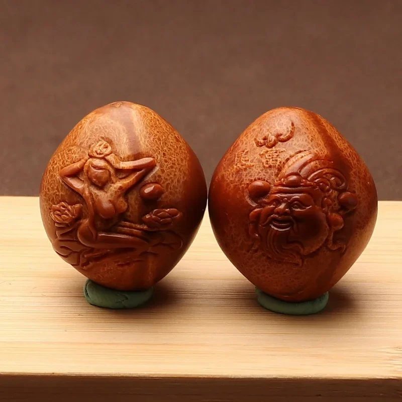 

Indonesia Big Olive Nut Carved Color Double Collection Handball Two Sides Carving God of Wealth Beauty Hand Pieces