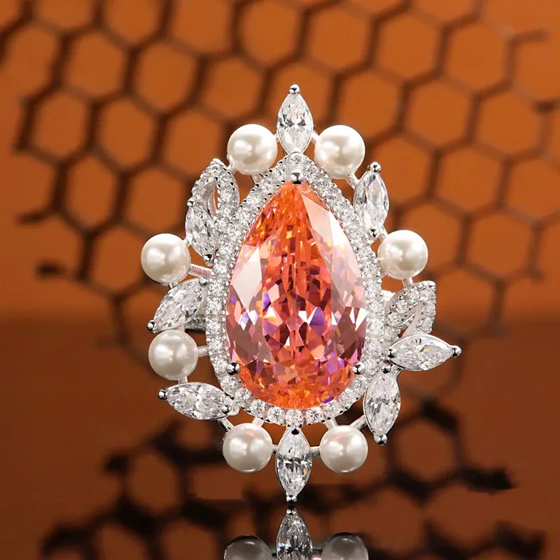 

2023 New S925 Silver Imported High Carbon Diamond Sunset Orange 11 * 15 Water Drop Embedding Pearl Ring for Women