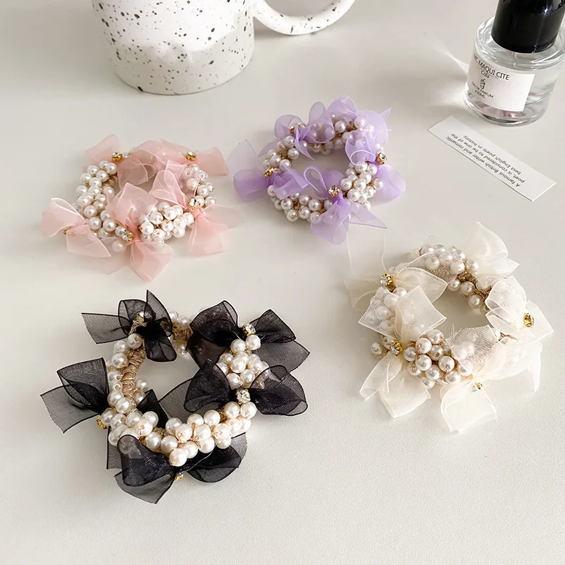 Korean hair ring head rope full of pearl beaded flowers rubber band fashionable temperament simple plate ponytail ball hair rope
Korean hair ring head rope full of pearl beaded flowers rubber band fashionable temperament simple plate ponytail ball hair rope