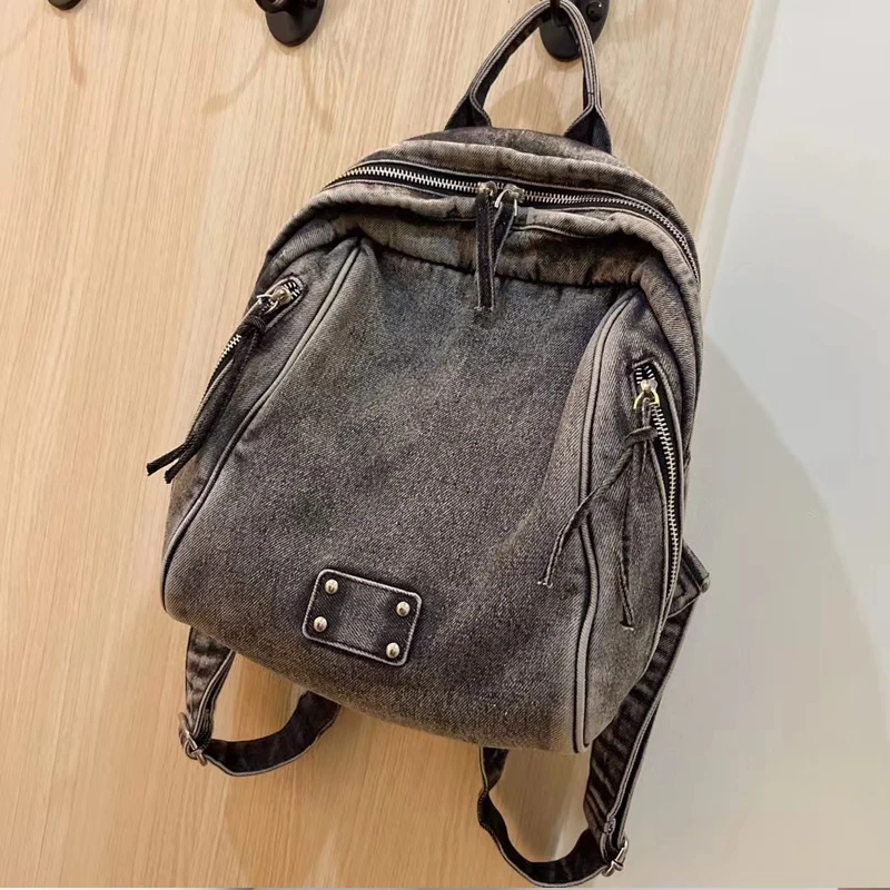 

Preppy Style Denim Cloth Backpacks For Women Luxury Designer Handbag And Purses 2023 New In Washing Process Rivet Small Shoulder