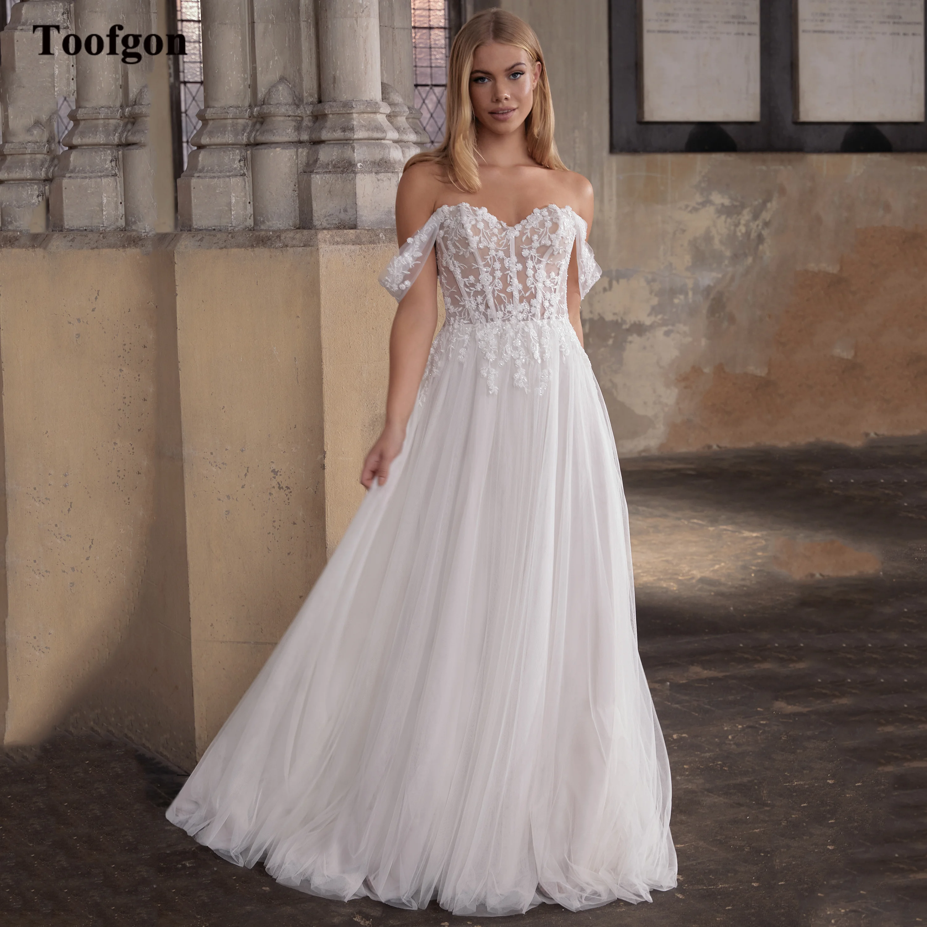 Toofgon Ivory Appliques Lace Bride Wedding Dresses Off The Shoulder Boho Formal Party Dress Women Bridal Gowns vestido de novia
Toofgon Ivory Appliques Lace Bride Wedding Dresses Off The Shoulder Boho Formal Party Dress Women Bridal Gowns vestido de novia
