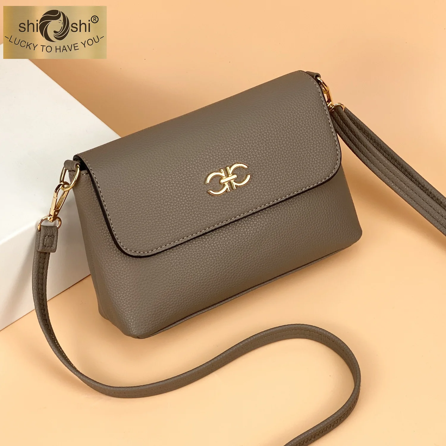 Bag female 2023 new leather texture ladies Joker Messenger bag large-capacity mobile phone bag middle-aged mother change
Bag female 2023 new leather texture ladies Joker Messenger bag large-capacity mobile phone bag middle-aged mother change